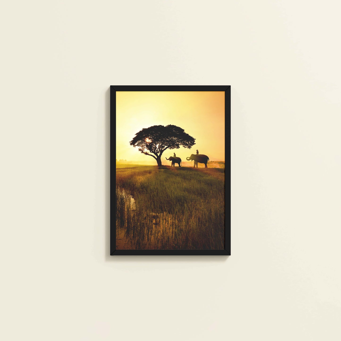 Wall View of Sunset Serenity – Elephants Under Tree Wall Art in Black Color Frame